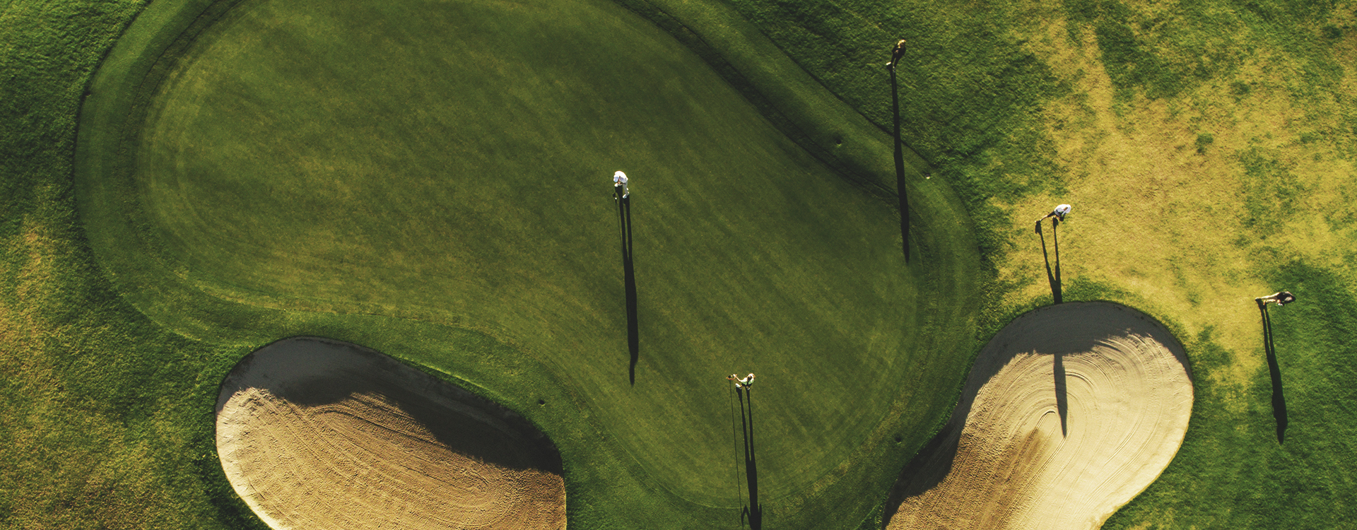 Aerial view of beautiful golf course with players